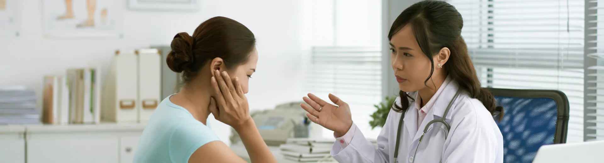Licensed healthcare provider conducting a virtual chronic care management consultation with a patient through telemedicine.