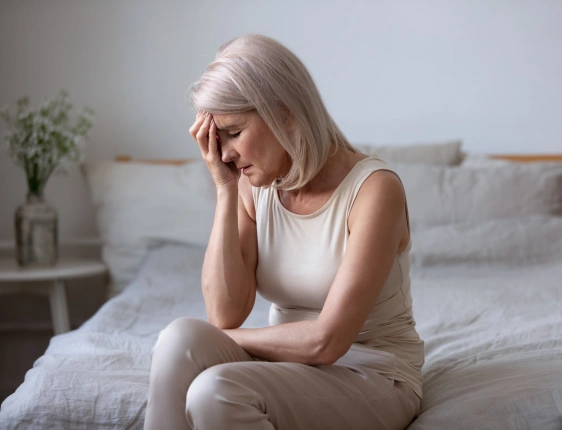 Menopause specialist consulting with a patient about hormonal health and wellness
